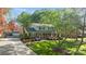 Charming two-story home with a landscaped front yard and brick accents at 6117 Brace Rd, Charlotte, NC 28211
