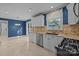 Open concept kitchen with stainless steel appliances and granite countertops at 6117 Brace Rd, Charlotte, NC 28211