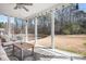 Relaxing screened porch with outdoor seating and views of the backyard at 835 Yucatan Dr, Waxhaw, NC 28173