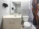 Simple bathroom with a vanity, toilet, and shower at 9427 S Vicksburg Park Ct, Charlotte, NC 28210