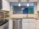 Kitchen with stainless steel appliances, granite countertops, and ample cabinet storage at 9427 S Vicksburg Park Ct, Charlotte, NC 28210