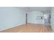 Hardwood floors throughout this condo living area adjacent to the bright kitchen at 101 S Laurel Ave # 72A, Charlotte, NC 28207