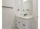 Bathroom featuring white vanity with modern fixtures and white cabinets at 10405 Briarhurst Pl # 18, Mint Hill, NC 28227