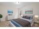 Serene bedroom showcasing neutral tones, stylish furnishings, and abundant natural light for a cozy retreat at 10405 Briarhurst Pl # 18, Mint Hill, NC 28227