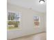 Bedroom with two windows and lots of natural light at 10405 Briarhurst Pl # 18, Mint Hill, NC 28227