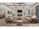 Beautiful living room featuring coffered ceilings, modern fireplace, and large windows at 10405 Briarhurst Pl # 18, Mint Hill, NC 28227