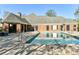 Community pool area is perfect for relaxation and recreation with ample space for residents at 11406 Olde Turnbury Ct, Charlotte, NC 28277