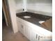 Bathroom features a double sink vanity with granite countertop at 122 Peppervine Ln, Statesville, NC 28625