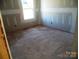 Bedroom with drywall, carpet and window at 122 Peppervine Ln, Statesville, NC 28625