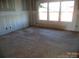 Bedroom with drywall, carpet and windows at 122 Peppervine Ln, Statesville, NC 28625