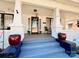 Inviting front porch has decorative pillars, potted plants, and a welcoming seating area at 127 E 11Th St, Salisbury, NC 28144