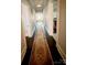 Hallway featuring neutral paint colors and a decorative rug at 127 E 11Th St, Salisbury, NC 28144