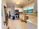 Well-lit kitchen with stainless steel appliances and white cabinetry at 127 E 11Th St, Salisbury, NC 28144