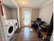 Functional laundry room with modern washer and dryer units at 127 E 11Th St, Salisbury, NC 28144