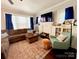 Cozy living room with a sectional sofa and a patterned rug at 127 E 11Th St, Salisbury, NC 28144