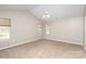 Neutral secondary bedroom with double windows, ceiling fan, and neutral carpet at 12810 English Walnut Ln, Charlotte, NC 28215