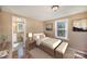 Cozy bedroom with natural light and a view of the adjoining bathroom at 15 Gumtree St, Wadesboro, NC 28170