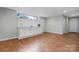 Bonus room with wooden floors and a built in storage unit at 1525 16Th Avenue Nw Cir, Hickory, NC 28601