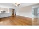 Open living area boasts hardwood floors, natural light, and seamless flow into the kitchen at 1525 16Th Avenue Nw Cir, Hickory, NC 28601