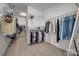 Walk-in closet with metal shelving and organization racks at 15606 Walnut Hill Dr, Charlotte, NC 28278