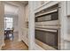 This kitchen showcases stainless steel double ovens and modern finishes at 15606 Walnut Hill Dr, Charlotte, NC 28278