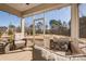 Inviting screened porch with comfortable seating, offering a serene outdoor living space at 15606 Walnut Hill Dr, Charlotte, NC 28278