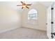 Light-filled bedroom with vaulted ceilings, neutral walls, and a large window with arched top at 1730 Townsend Ln, Rock Hill, SC 29730