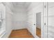 The walk-in closet features white wire shelving and ample storage with a mirrored door at 1730 Townsend Ln, Rock Hill, SC 29730