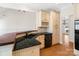 This kitchen features modern appliances, granite countertops, and a breakfast bar with wood accents at 1730 Townsend Ln, Rock Hill, SC 29730