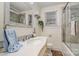 Classic bathroom with a framed mirror, and tiled shower, showcasing a blend of comfort and functionality at 1783 Reepsville Rd, Lincolnton, NC 28092