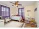 A charming bedroom with hardwood floors, filled with toys, natural light, and whimsical decor at 1783 Reepsville Rd, Lincolnton, NC 28092
