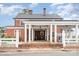 Charming brick home with a covered porch featuring elegant white columns and well-maintained landscaping at 1783 Reepsville Rd, Lincolnton, NC 28092