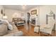 Comfortable living room showcasing hardwood floors, a fireplace, and plush seating for relaxation and gatherings at 1783 Reepsville Rd, Lincolnton, NC 28092