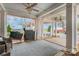Covered patio with ample space for outdoor seating, grilling, and relaxing in a serene setting at 1783 Reepsville Rd, Lincolnton, NC 28092