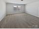 Spacious bedroom with neutral carpet and windows at 2018 Hyacinth Ct, Denver, NC 28037