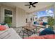 Relaxing screened-in patio with comfortable seating, perfect for enjoying the outdoors at 2018 Mantle Ridge Dr, Indian Trail, NC 28079