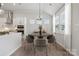 Charming dining area with large windows allowing for plenty of natural light at 2018 Mantle Ridge Dr, Indian Trail, NC 28079