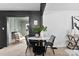 Cozy dining area with modern furniture and decor, perfect for Gathering meals and entertaining guests at 212 Sloan St, Belmont, NC 28012