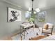 Inviting home office with a white desk, comfortable seating, and lots of natural light at 212 Sloan St, Belmont, NC 28012