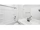 All-white bathroom with black hardware and shower/tub combo at 228 Miramar Dr, York, SC 29745
