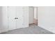 Bedroom with double door closet and carpet floors at 228 Miramar Dr, York, SC 29745
