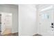 Bright foyer with a view into the bathroom and featuring tile and wood-look flooring at 228 Miramar Dr, York, SC 29745