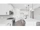 Elegant kitchen with white cabinetry, stainless steel appliances, and a stylish island with a sink at 228 Miramar Dr, York, SC 29745