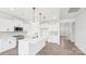 Modern kitchen featuring stainless appliances, white cabinets, and an open layout for seamless entertaining at 228 Miramar Dr, York, SC 29745