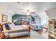 Spacious bedroom featuring dual beds, ceiling fan, accent wall, and ample natural light at 2324 Chestnut Ln, Matthews, NC 28104