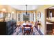 Charming dining room with bay window, elegant furnishings, and a cozy atmosphere perfect for intimate meals at 2324 Chestnut Ln, Matthews, NC 28104
