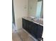 Modern bathroom featuring a dark vanity and shower at 2358 Fay Jones Rd, Denver, NC 28037