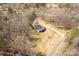 Home with a long private driveway surrounded by dense woods, and outbuilding in backyard at 4604 Karwood Dr, Rock Hill, SC 29732
