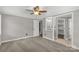 Bedroom featuring neutral carpet and gray walls and a view of the bathroom at 4604 Karwood Dr, Rock Hill, SC 29732