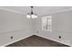 Bright dining room featuring laminated wood flooring and natural light at 4604 Karwood Dr, Rock Hill, SC 29732